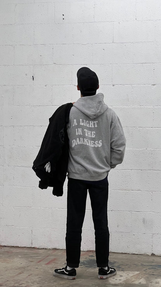 A LIGHT IN THE DARKNESS HOODIE