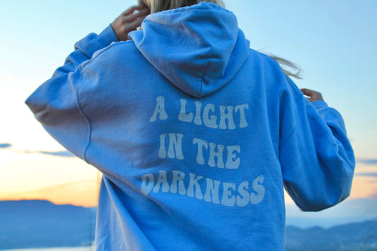 A LIGHT IN THE DARKNESS HOODIE