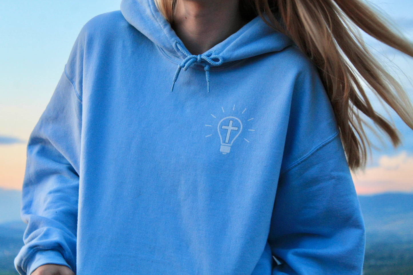 A LIGHT IN THE DARKNESS HOODIE